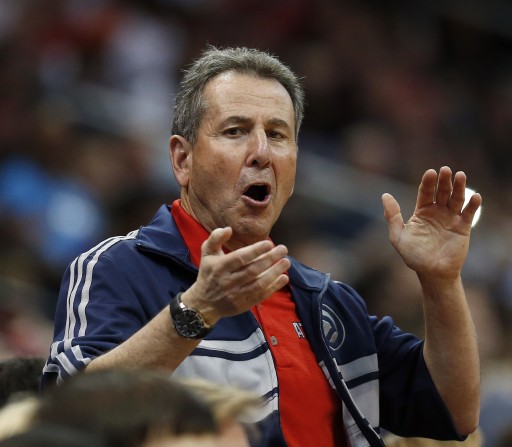 FILE - In this April 26, 2014, file photo, Atlanta Hawks co-owner Bruce Levenson cheers from the stands in the second half of Game 4 of an NBA basketball first-round playoff series against the Indiana Pacers in Atlanta. (AP Photo/John Bazemore, File)