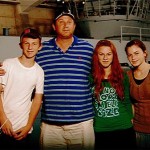 This photo taken July 12, 2010 at Chicago's Museum of Science and Industry and provided by the Menora famiy shows Shalom Menora and three of his children Yossi Menora, 13, left; Rikki Menora, 16, second from right; and Rachel Menora, 14, right, all from Bet Shemesh, Israel. The two daughters along with their grandfather Moshe Menora, of Skokie, Ill., and another one of his granddaughters, Sara Klein, 17, of Jerusalem were killed Tuesday, July 13, 2010, when their small plane crashed on an interstate in Michigan's Upper Peninsula. Yossi was hospitalized Wednesday after being ejected from the aircraft. He was the only survivor from the Tuesday evening crash. (AP Photo/Museum of Science and Industry via courtesy the Menora family)