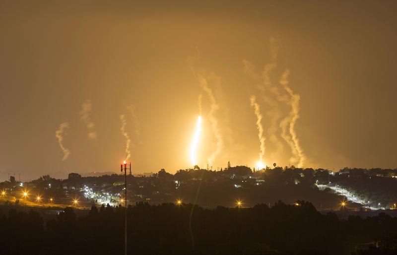 The Israeli community of Netiv Haasara is seen in front of flares fired by the Israeli army in Gaza July 23, 2014. Reuters