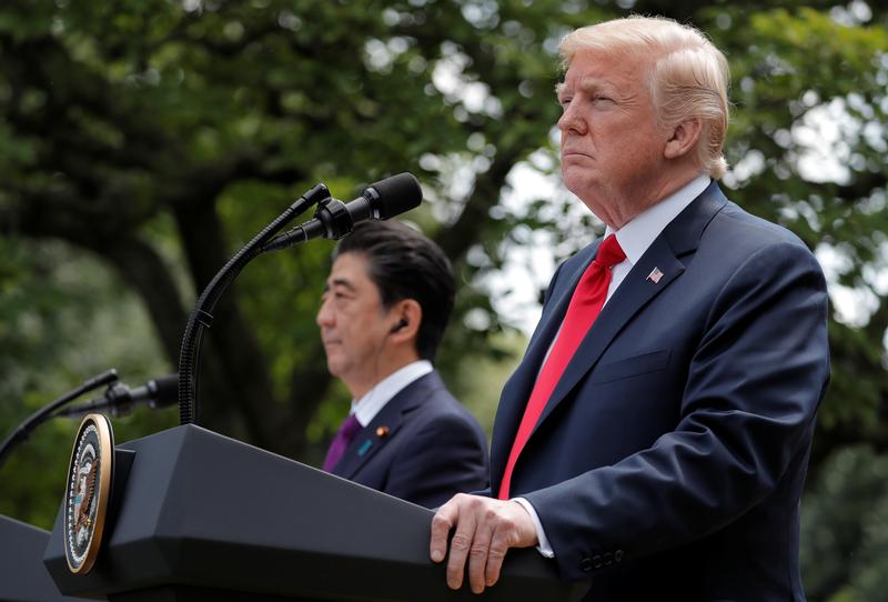 Japan's Prime Minister Shinzo Abe and U.S. President Donald Trump hold a joint news conference in the Rose Garden of the White House in Washington, U.S., June 7, 2018. REUTERS/Carlos Barria