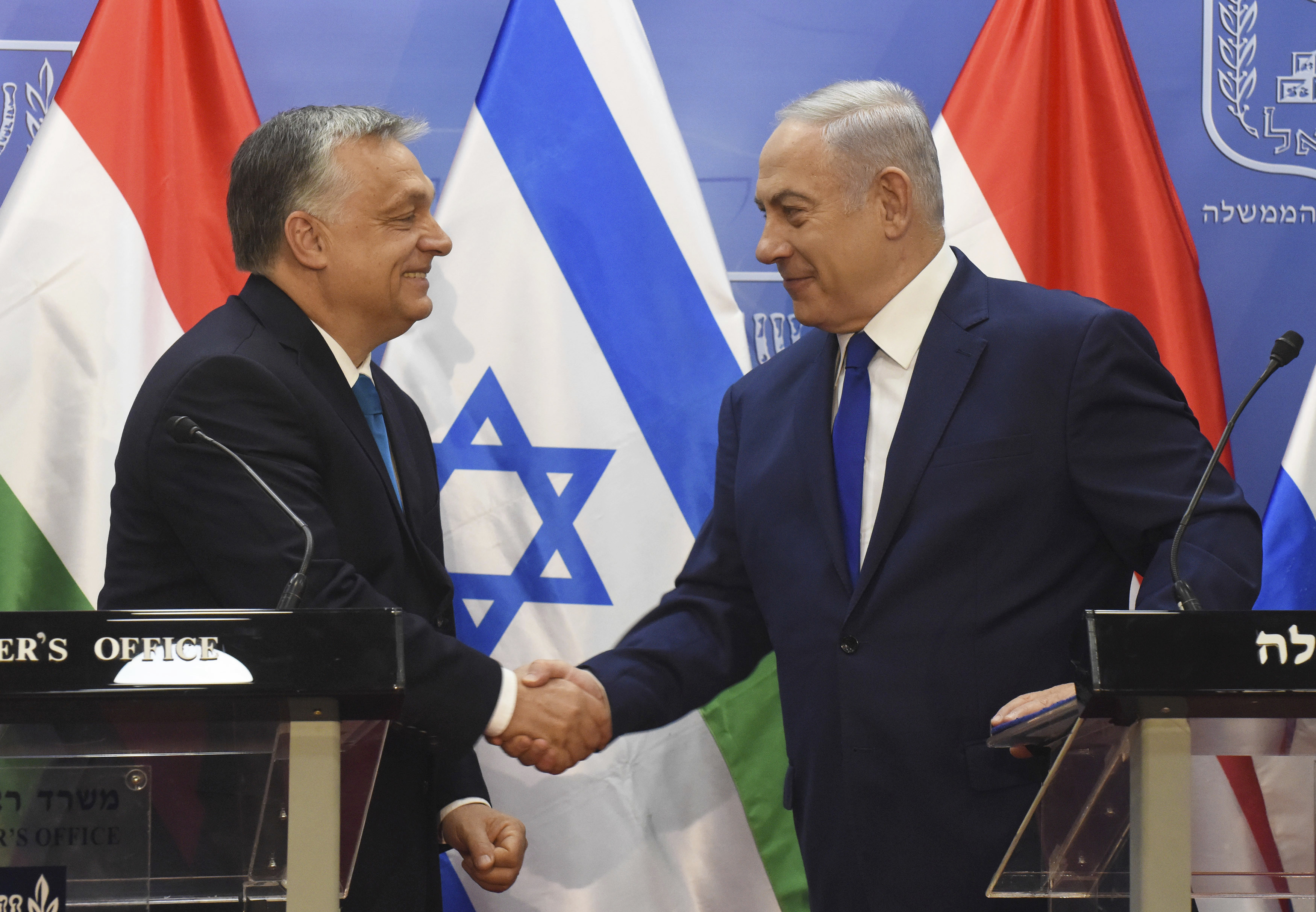 Hungarian Prime Minister Viktor Orban (L) shake hands with Israeli Prime Minister Benjamin Netanyahu ( R ) on during joint statements at the prime minister's office in Jerusalem, Israel, July 19, 2019.