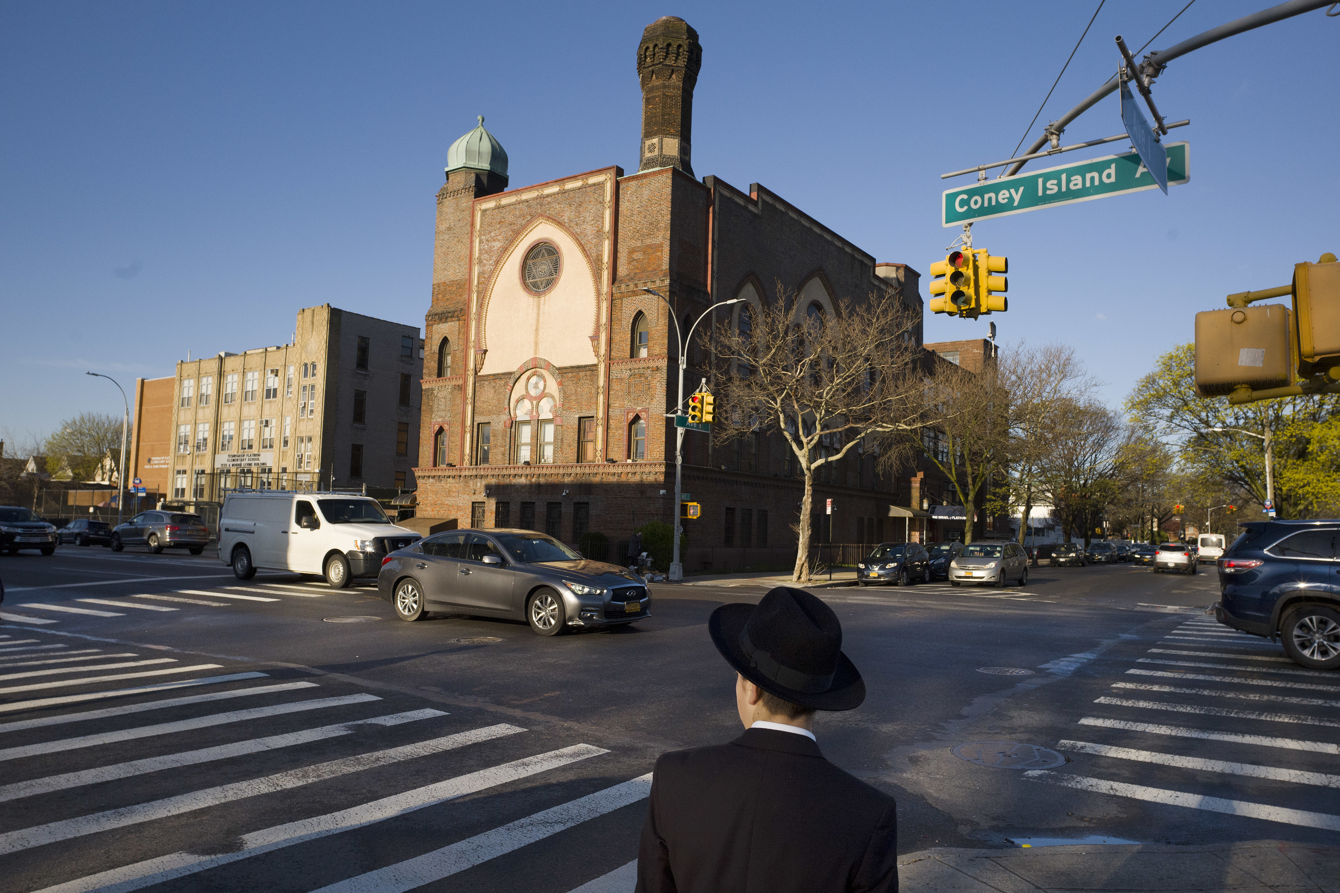 In this April 26, 2018 photo, a Jewish boy walks to a yeshiva in the Brooklyn borough of New York. AP