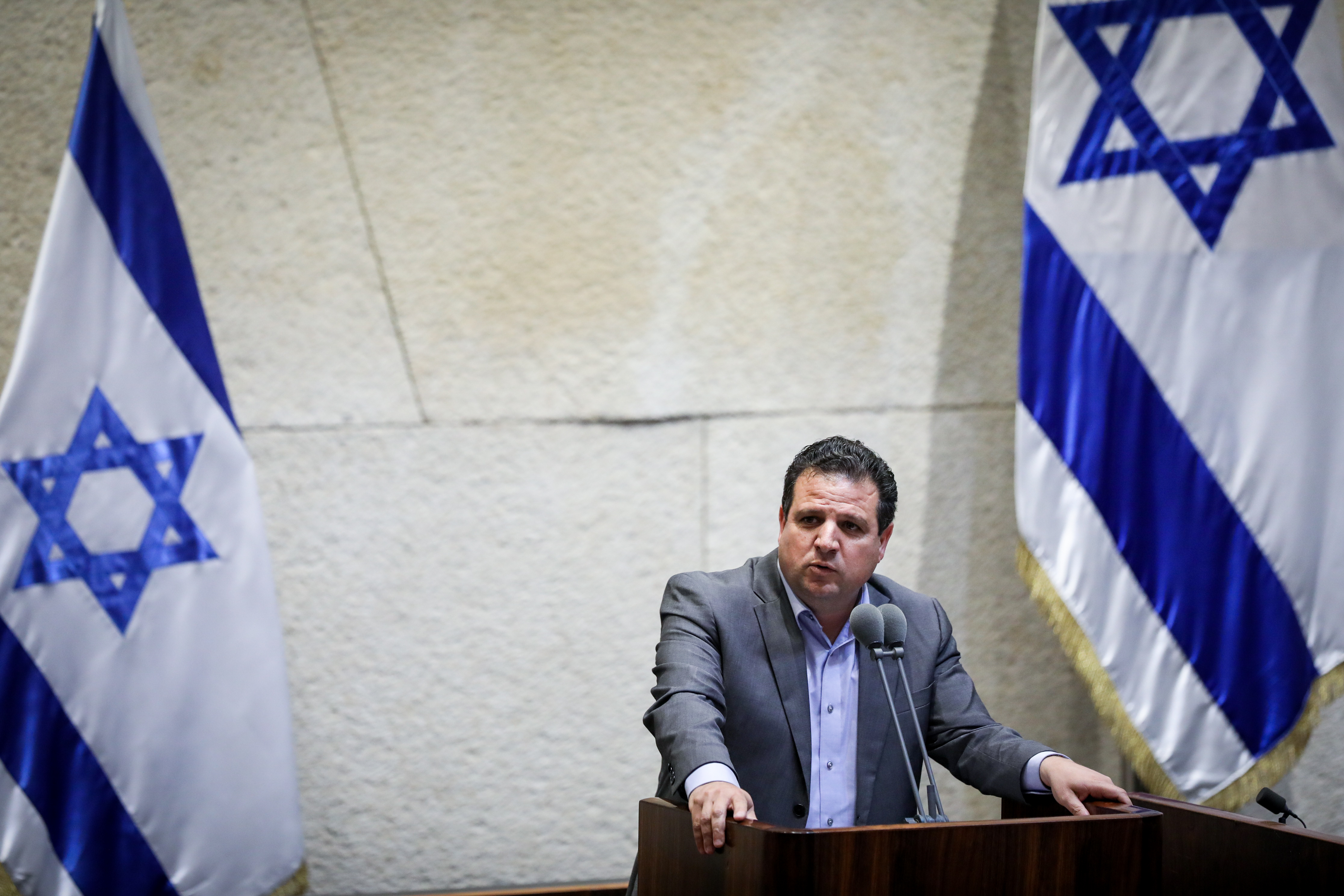 FILE - Hadash-Ta'al party leader Ayman Odeh speaks during a discussion on a bill to dissolve the parliament, at the Knesset, in Jerusalem on May 29, 2019. Photo by Noam Revkin Fenton/Flash90