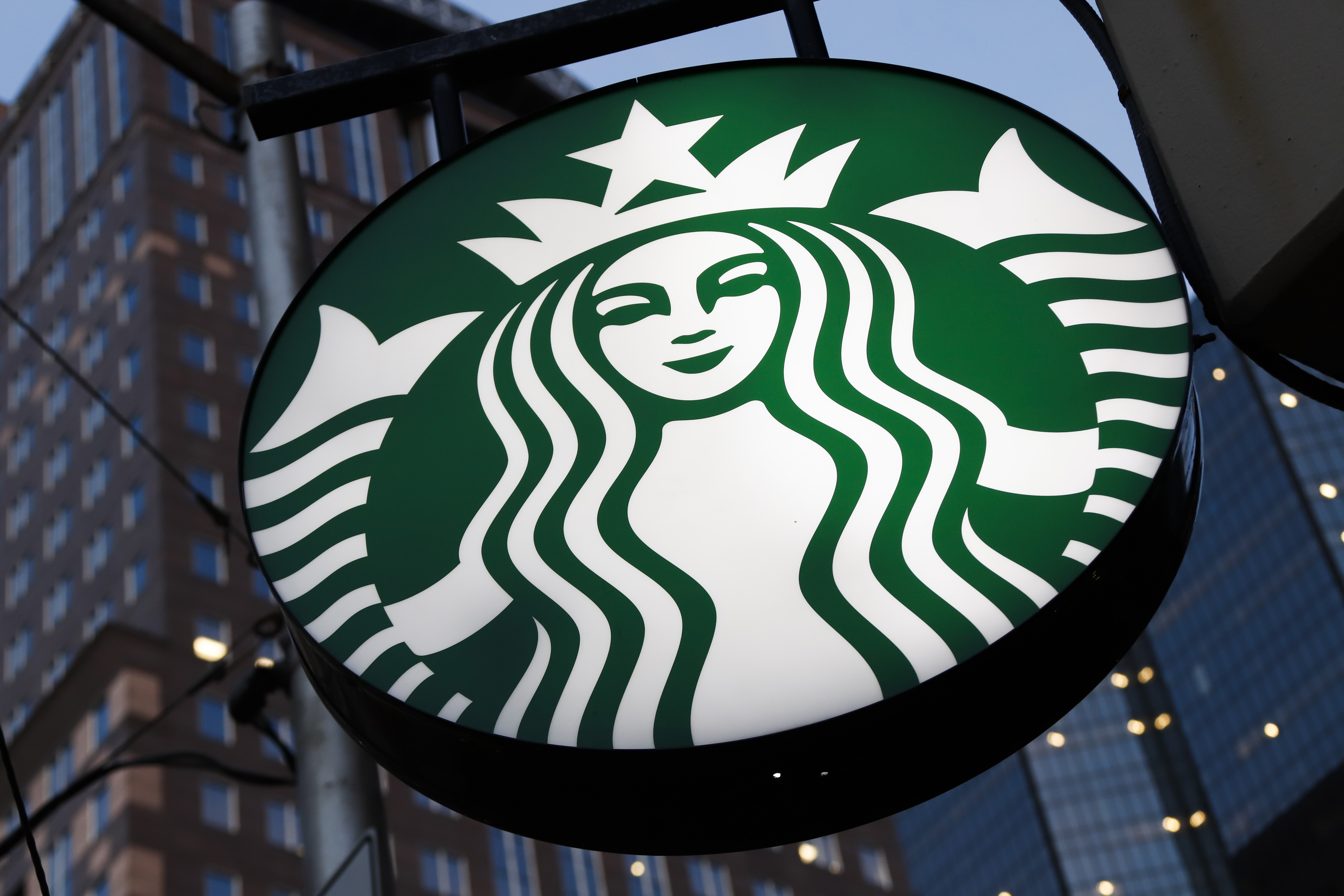 This is the Starbucks sign outside a Starbucks coffee shop in downtown Pittsburgh on Wednesday, June 26, 2019. (AP Photo/Gene J. Puskar)