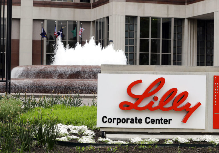 FILE- In this April 26, 2017, file photo shows the Eli Lilly and Co. corporate headquarters in Indianapolis. Shares of Eli Lilly and Co. jumped early Thursday, June 24, 2021, after the drugmaker said it will seek approval for its potential Alzheimer’s treatment later this year. (AP Photo/Darron Cummings, File)