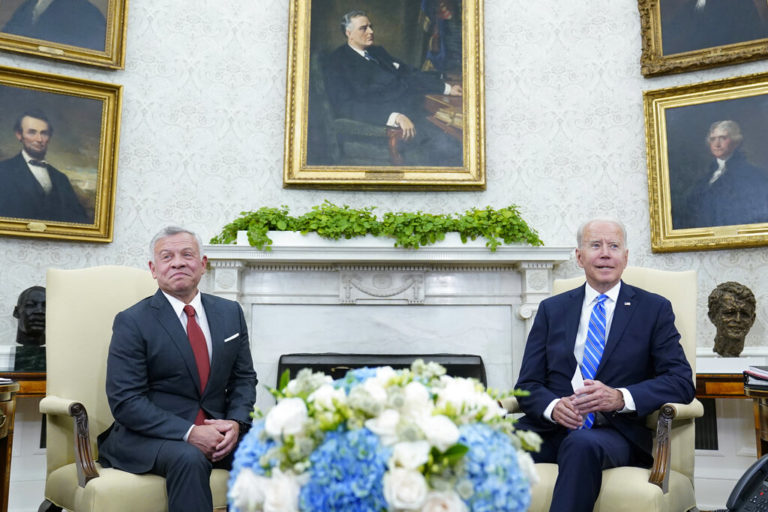 President Joe Biden, right, meets with Jordan's King Abdullah II, left, in the Oval Office of the White House in Washington, Monday, July 19, 2021. (AP Photo/Susan Walsh)