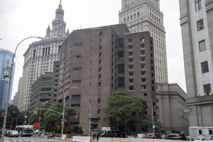 FILE - This Aug. 13, 2019 file photo shows The Metropolitan Correctional Center in New York. The U.S. government said Thursday, Aug. 26, 2021, it is shutting down the embattled federal jail in New York City after a slew of problems that came to light following Jeffrey Epstein’s suicide there two years ago. (AP Photo/Mary Altaffer, File)