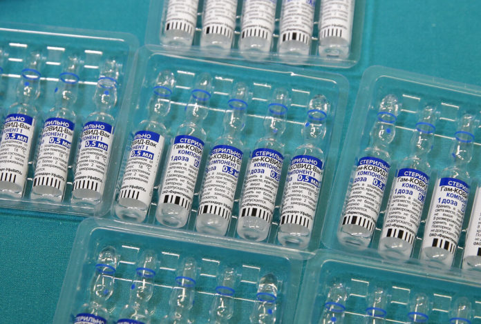 FILE - In this Friday, April 9, 2021 file photo, vials containing Russia's Sputnik V vaccine for COVID-19 are seen at the San Marino State Hospital, in San Marino. The South African drug regulator has rejected the Russian-made coronavirus vaccine Sputnik V, citing some safety concerns the manufacturer wasn't able to answer. In a statement on Tuesday, Oct. 19, 2021 the country's regulator, also known as SAHPRA, said the request for Sputnik V to be authorized could “not be approved at this time,” referring to past failed HIV vaccines that used a similar technology. (AP Photo/Antonio Calanni, File)