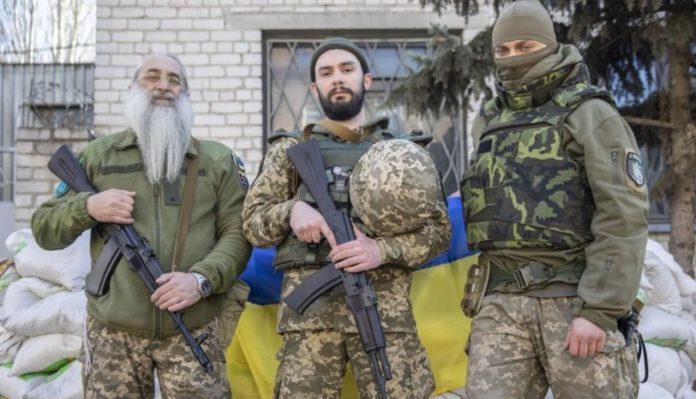 In Dnipro, Orthodox Father And Son Soldiers Are ‘Ready To Kill Russian Soldiers’