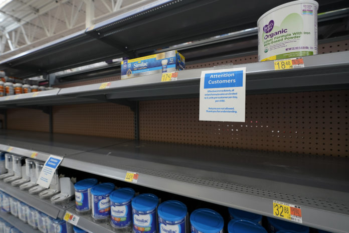 FILE - Shelves typically stocked with baby formula sit mostly empty at a store in San Antonio, Tuesday, May 10, 2022. A massive baby formula recall, combined with COVID-related supply chain problems, is getting most of the blame for the shortage that's causing distress for many parents across the U.S. But the nation's formula supply has long been vulnerable to this type of crisis, experts say, due to decades-old rules and policies that have allowed a handful of companies to corner nearly the entire U.S. market. (AP Photo/Eric Gay, File)