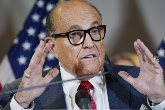 Rudy Giuliani Slapped in Supermarket While Campaigning for Son Andrew