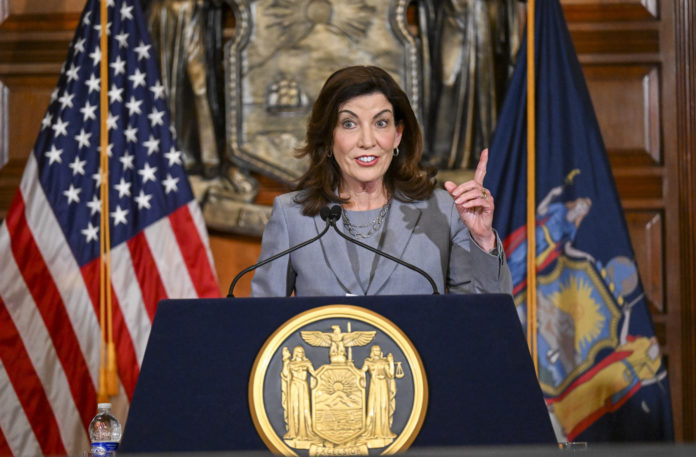 FILE - New York Gov. Kathy Hochul speaks to reporters about legislation passed during a special legislative session in the Red Room at the state Capitol, July 1, 2022, in Albany, N.Y. As President Joe Biden runs up against the limits of what he can do on abortion, gun control and other issues without larger Democratic majorities in Congress, some in his party want more fire and boldness than the president's acknowledgement of their frustration and calls imploring people to vote in November.(AP Photo/Hans Pennink, File)