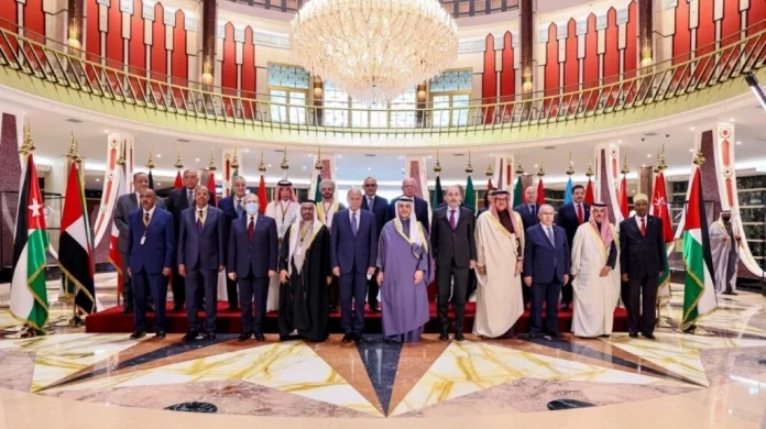 Participant Foreign Ministers pose for a family photo during a meeting of the foreign ministers of the Arab League states in Kuwait, Jan. 30, 2022. (Kuwait Foreign Ministry/Handout/Anadolu Agency via Getty Images)
