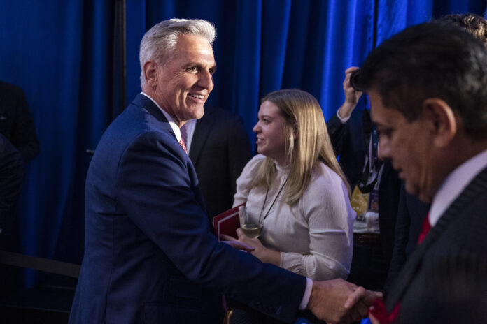 House Minority Leader Kevin McCarthy of Calif., greets supporters after speaking at an event early Wednesday morning, Nov. 9, 2022, in Washington. (AP Photo/Alex Brandon)