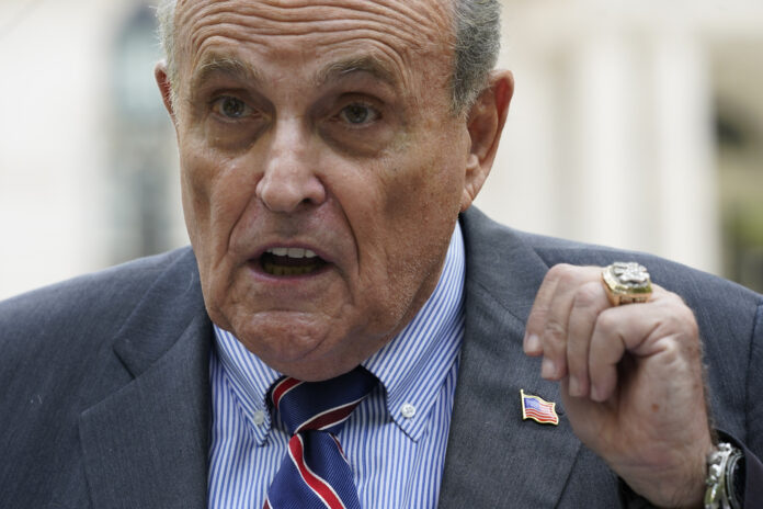 FILE - Former New York City mayor Rudy Giuliani speaks during a news conference on Tuesday, June 7, 2022, in New York. Prosecutors in New York do not plan to bring criminal charges against Giuliani in connection with a probe into his interactions with Ukrainian figures, they revealed in a letter to a judge Monday, Nov. 14, 2022. (AP Photo/Mary Altaffer, File)