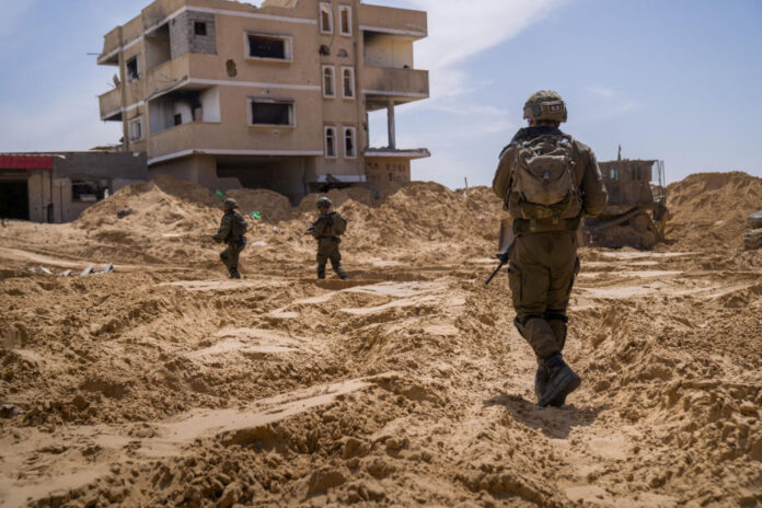 FILE PHOTO: Israeli army video said to show troops in Gaza's south as military operation expands