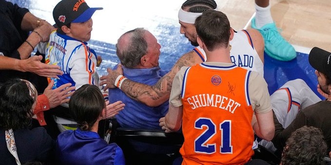 Watch: Bloomberg Avoids Injury After Player Lands in Courtside Seats