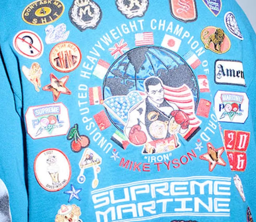 Mike Tyson’s Legal Team Accuses Supreme Of Breaching Contract Over Flag Swap On...